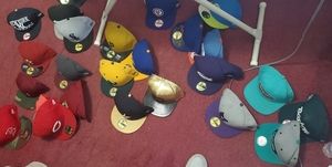 Variety of fitted and snapback hats